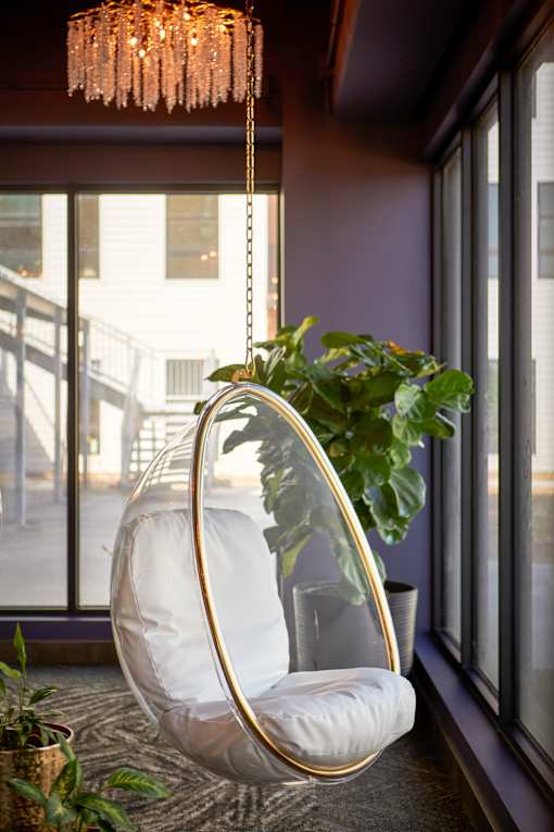 White Hanging Chair at Parallel Apartments, Omaha, NE
