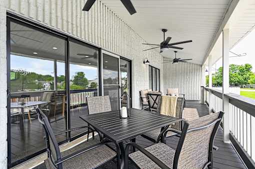 Patio at Renaissance at Carol Stream featuring a table and chairs in Carol Stream, IL.