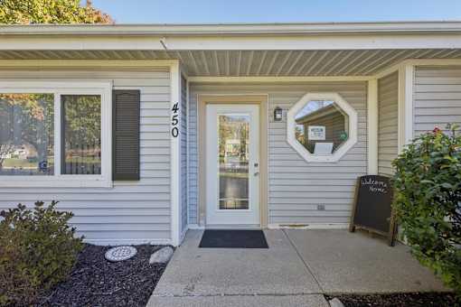 A house numbered 500 with a white door and a sign that says "Under Construction".