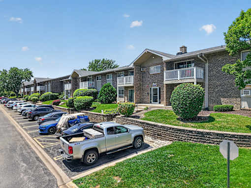 Exterior view of the building and parking lot at Renaissance at Carol Stream in Carol Stream, IL.