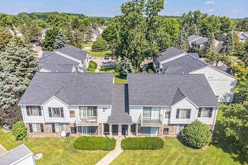 Two-story building with balconies at Bainbridge Park Canton MI