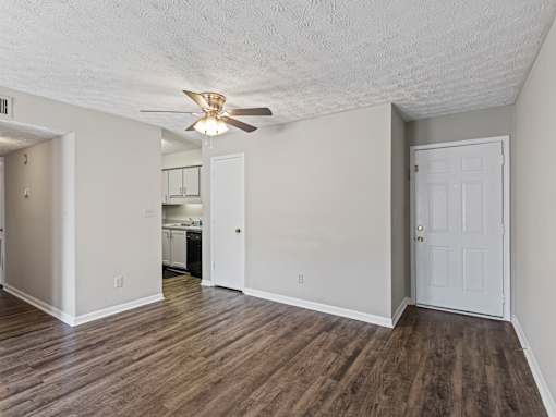 Room with wood floors and ceiling fan at Stratford Village Montgomery AL