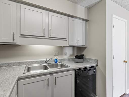Kitchen with dishwasher at Stratford Village Montgomery AL