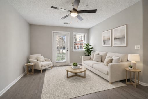 Living room with ceiling fan at Avalon Place Columbia SC