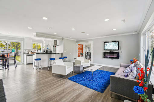 Community lounge with bar and TV at Bainbridge Park Canton MI