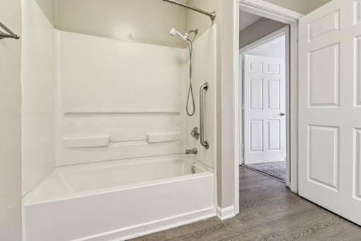 Bathroom with tub and shower at Avalon Place Columbia SC