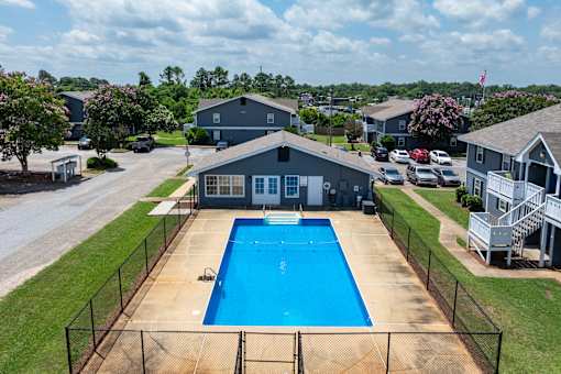 Fenced swimming pool at Arbours at Victoria Place Prattville AL