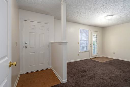 Room with window and door at Arbours at Victoria Place Prattville AL