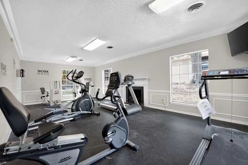 A well-equipped gym with a variety of exercise machines.