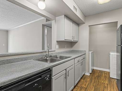 Kitchen with wood floors at Park at Meadow Ridge Montgomery AL