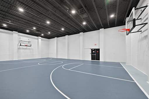 Basketball court with a hoop at Renaissance at Carol Stream in Carol Stream, IL.