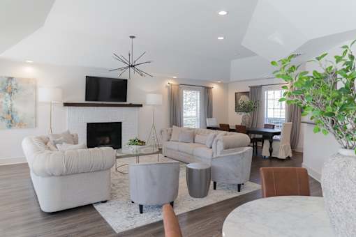 Lounge with fireplace and TV at Park at Meadow Ridge Montgomery AL