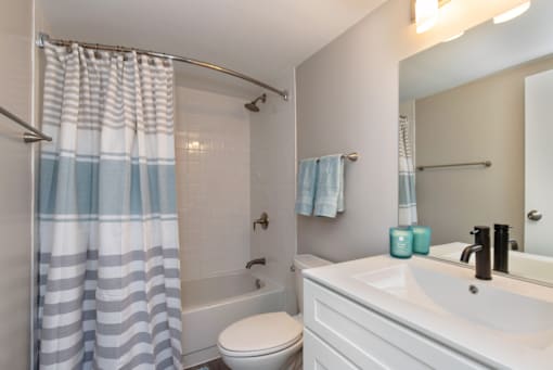 a bathroom with a toilet and a sink