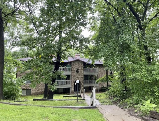 a house with trees in front of it