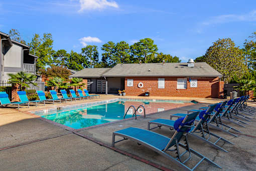 Resort-Style Pool with Seating at Lakeland East Apartments – Flowood, MS