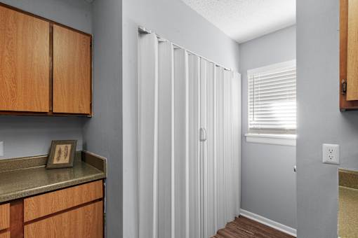 Spacious Kitchen with Pantry at Lakeland East Apartments – Flowood, MS