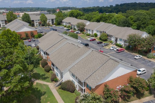 arial view of a building with a gray roof