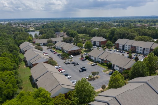 arial view of a neighborhood with houses and trees