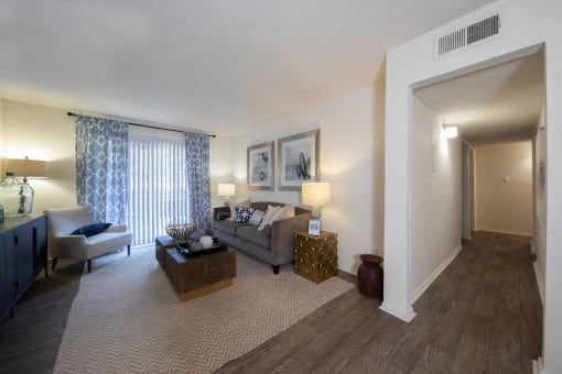 a living room with a couch and a chair