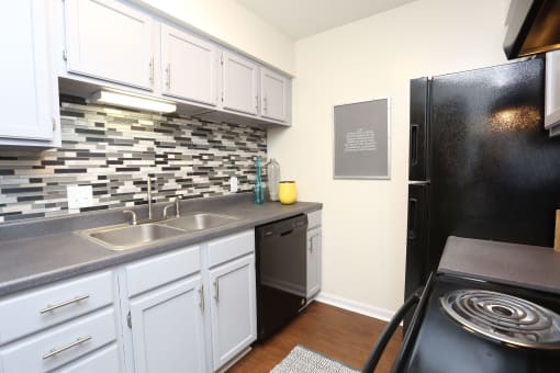 this is a photo of the kitchen of a 560 square foot, 1 bedroom apartment at as