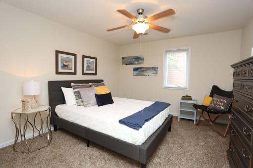 this is a photo of the bedroom of a 2 bedroom apartment at deer hill apartments in c