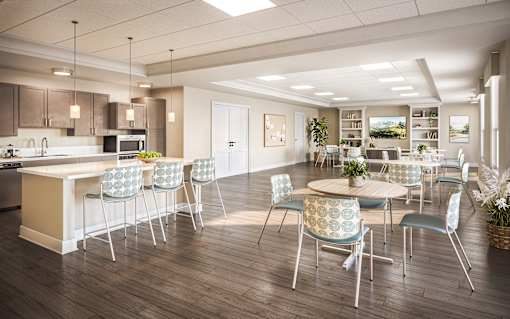 A modern kitchen with a dining table and chairs. at Evergreen Heights Apartments, Toledo, OH, 43614