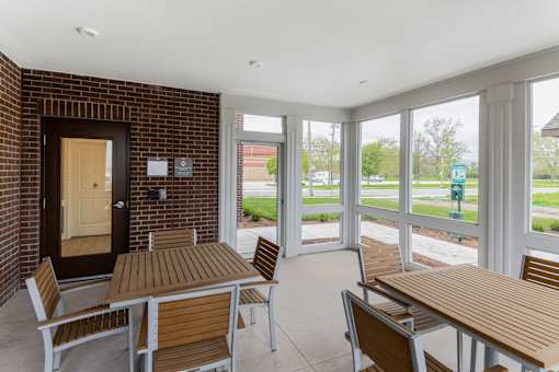 A patio with a table and chairs is shown.