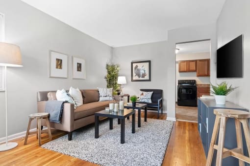 a living room with a couch and a tv
