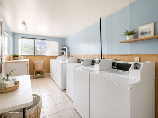 A laundry room with a washer and dryer.