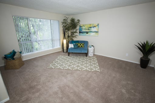 Model home living room at Abby Creek Apartments, Carmichael, CA 95608 