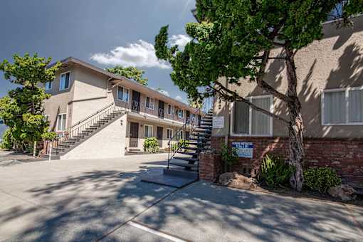 4th Street Apartment Building & Sidewalk and Trees