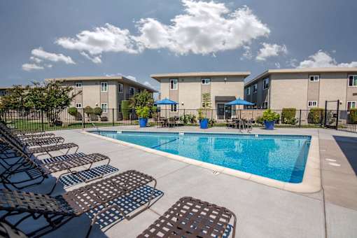 Pool Area with Sun Chairs at Monterey Manor Apartments, California, 95111