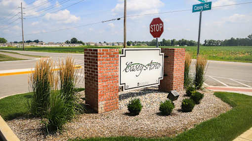 A monument sign for casey acres apartments