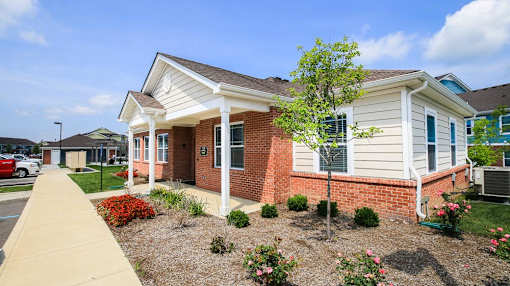 exterior view of casey acres apartments clubhouse building in westfield, in