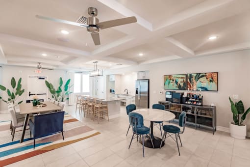 a dining room and kitchen with a table and chairs at Swiftwater apartments in Port Charlotte, FL