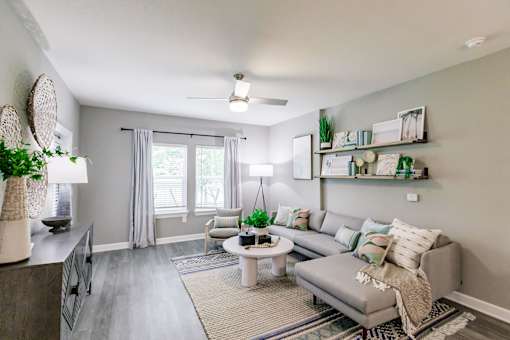 a living room with a couch and a table