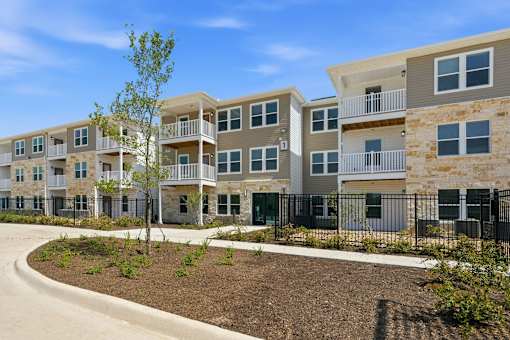 An exterior of an apartment complex.