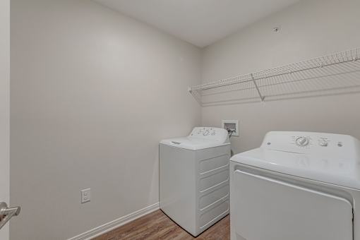 A laundry room with a washer and dryer.