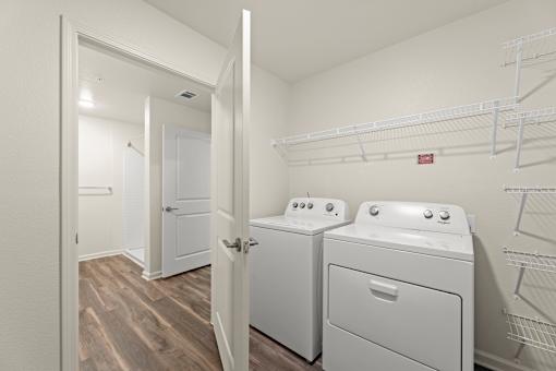 A laundry room with a washer and dryer.