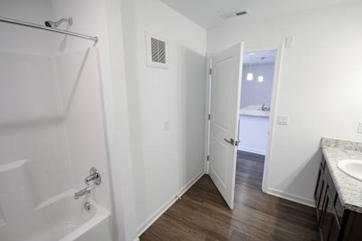 A bathroom with shoer and sink indmiller Pointe apartments in Columbus, Ohio