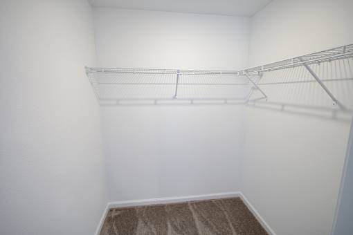 An empty closet with shelving indmiller Pointe apartments in Columbus, Ohio