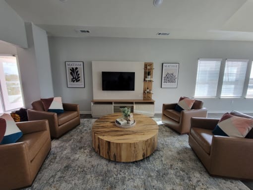 a living room with couches and a coffee table