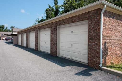 A row of garage doors are closed.