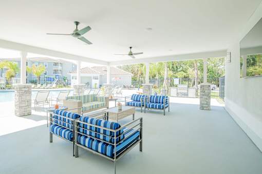 Lounge area outside with couches at Trillium apartments in Melbourne fl