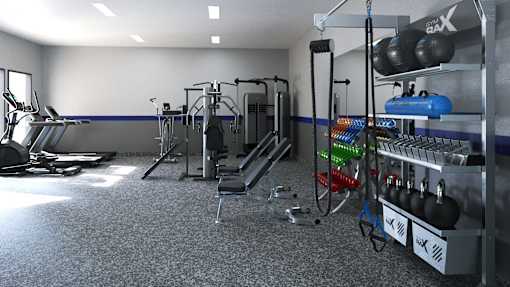 A gym with a variety of equipment including treadmills, weight racks, and exercise balls.