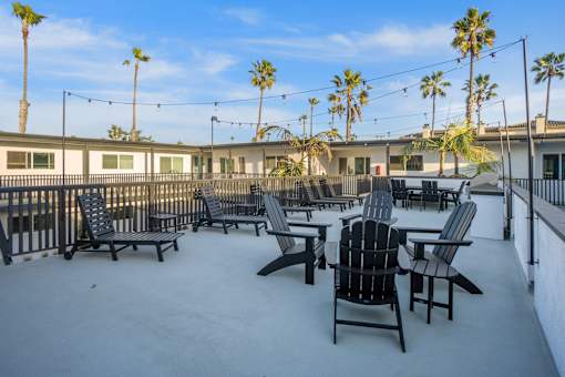 Deck with BBQ at Ocean Breeze Terrace Apartment, Huntington Beach