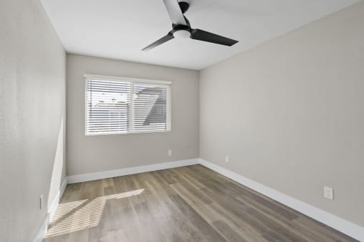 bedroom with ceiling fan at Ocean Breeze Terrace Apartment, Huntington Beach, CA, 92648