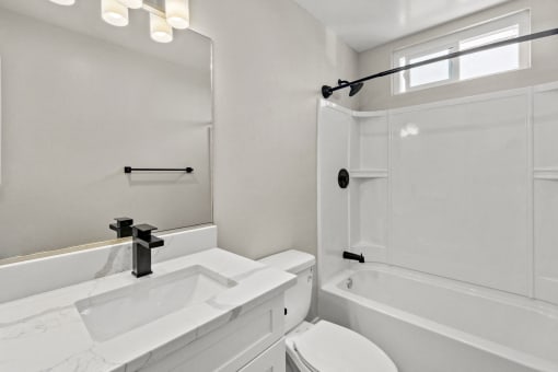 renovated bathroom at Ocean Breeze Terrace Apartment, Huntington Beach