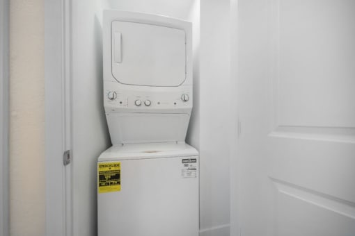 Stacked Washer Dryer at Hamilton Courtyard Apartments, California, 92627