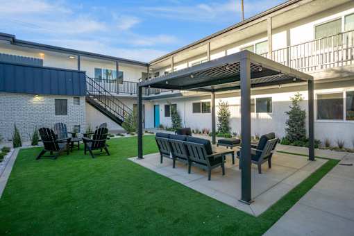 Pergola with seating at Ocean Breeze Terrace Apartment, California, 92648
